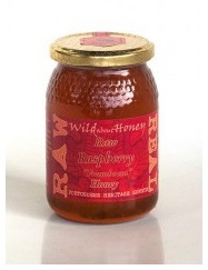 Foto van Wild about honey honey framboos 500gr via drogist